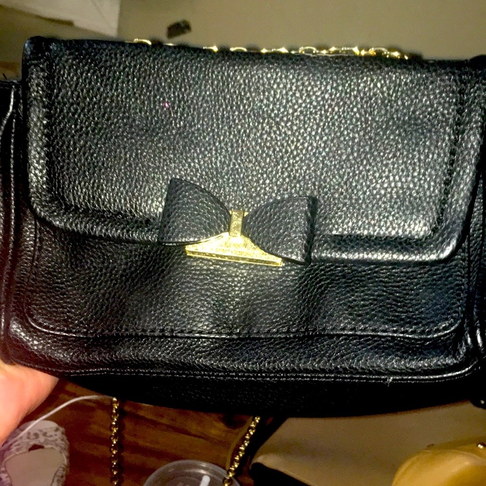 Nice black lulu Guinness purse